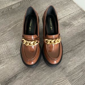 Brown Madden girl loafer heels.